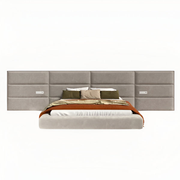 Bed with a large upholstered headboard on a white background